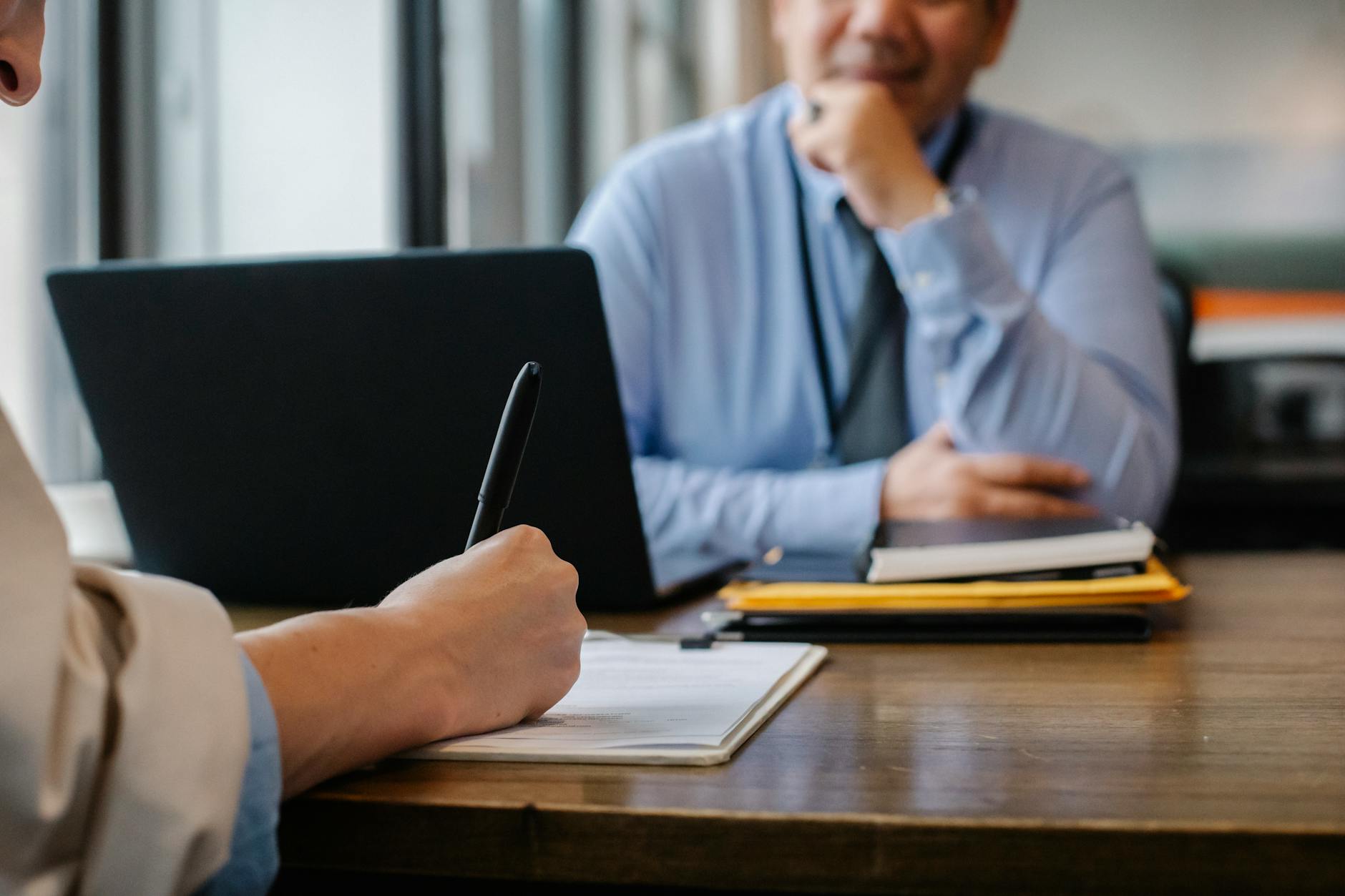 An editorial-style workspace with a resume draft, notes, and practical job application planning