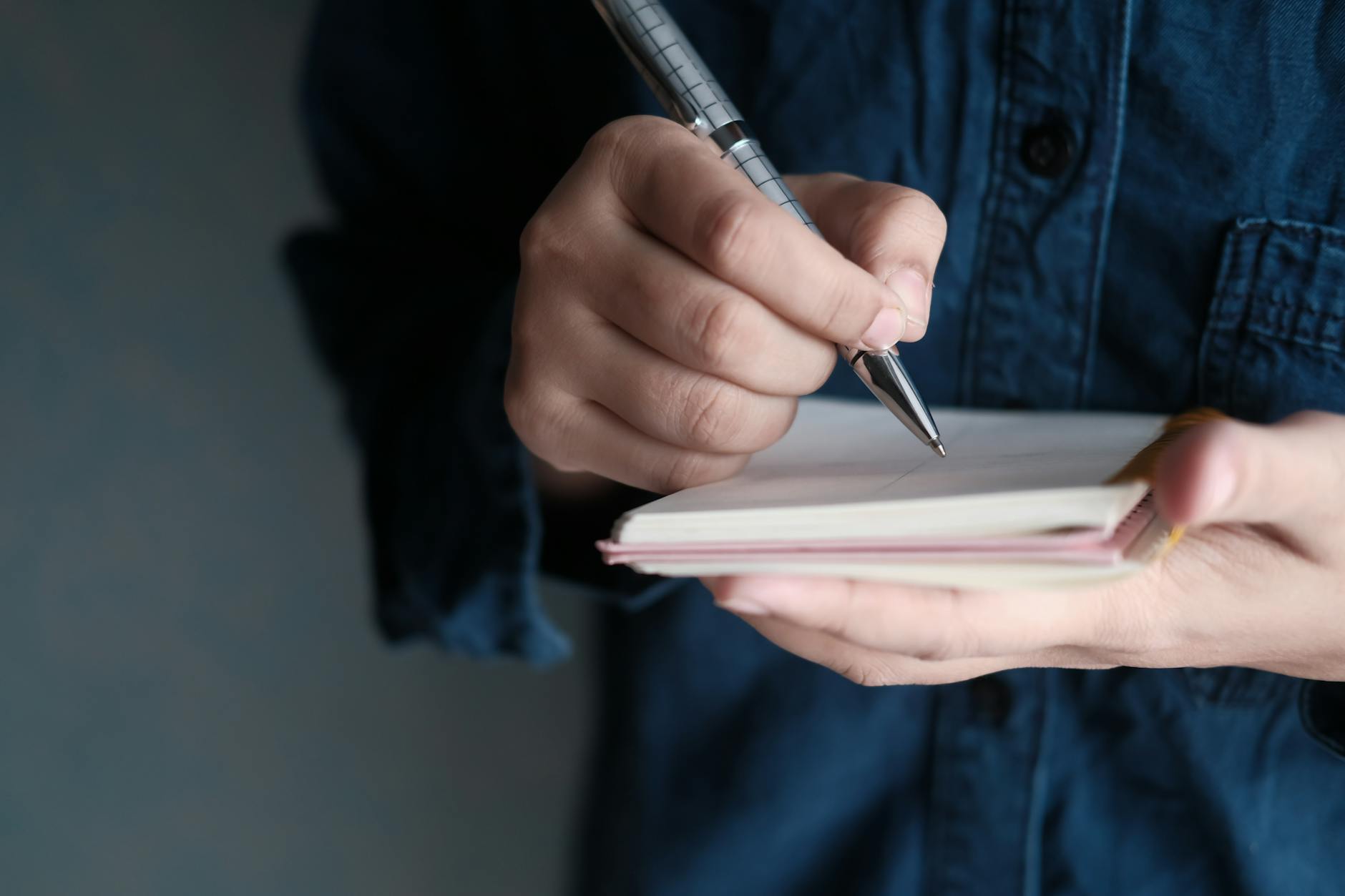 A resume experience section being edited for stronger bullet points